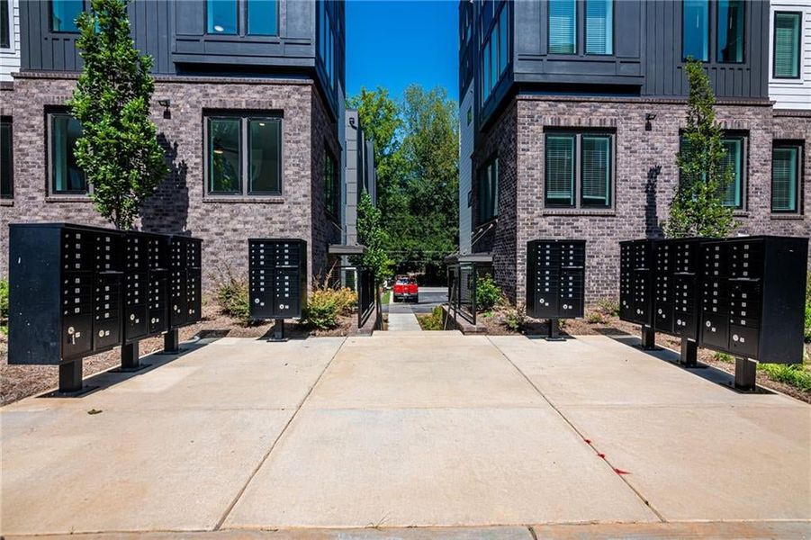 Central mailbox kiosk with tasteful landscaping