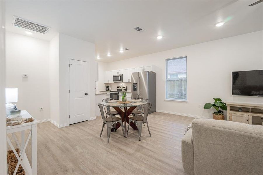 Dining area featuring light hardwood / wood-style floors