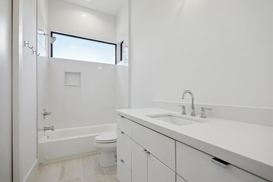 Large windows in the front secondary bathroom.