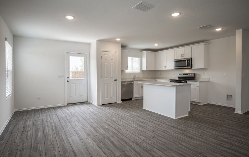 View of dining and kitchen areas