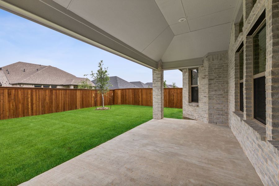 Covered Patio in the Daltrey home plan by Trophy Signature Homes – REPRESENTATIVE PHOTO