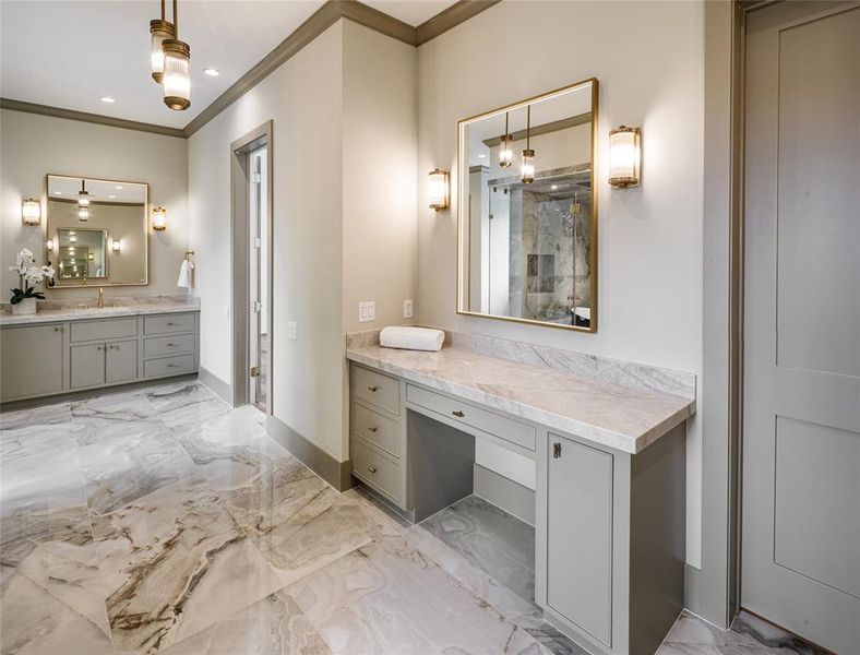 Alternate primary bath view, features His side vanity with LED mirror and wall sconces