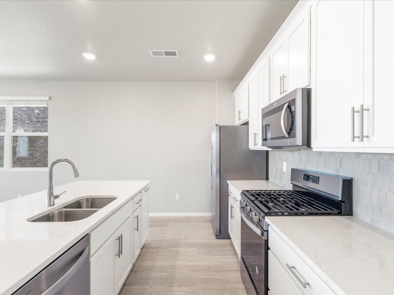 The Woodland floorplan interior image taken at a Meritage Homes community In Aurora, CO.