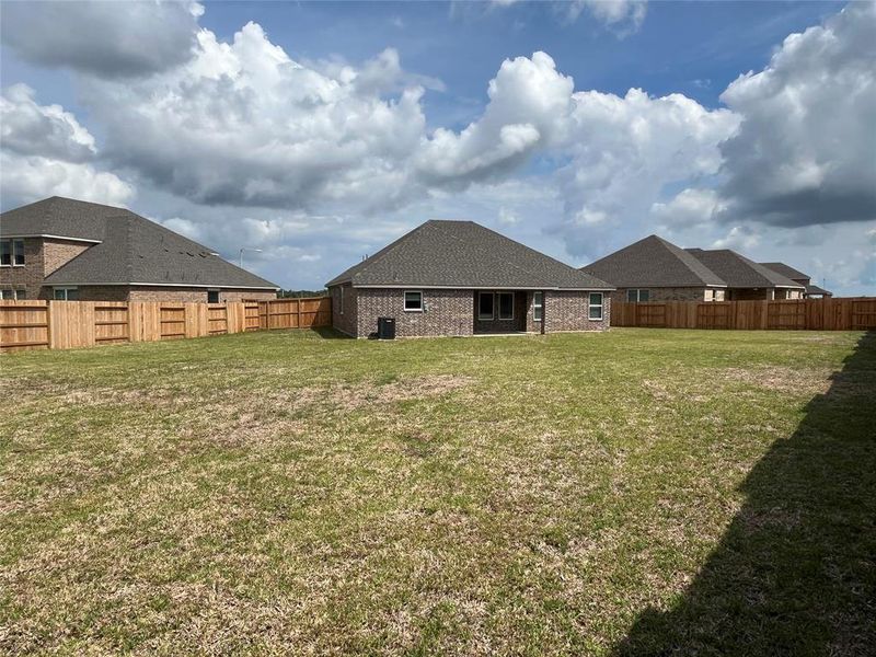 This backyard is an entertainers delight! It is large enough to put in a private pool or add in an outdoor kitchen and entertaining space.