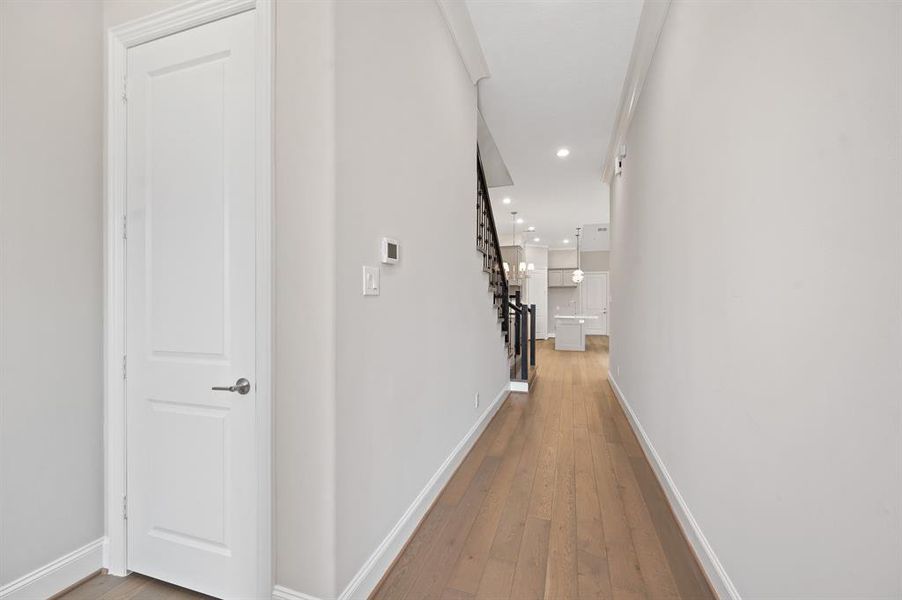 Welcome your guests into this elegant foyer! From the beautiful front doors  to the lovely wood flooring, you can sense the charm and elegance of this home from the first look.