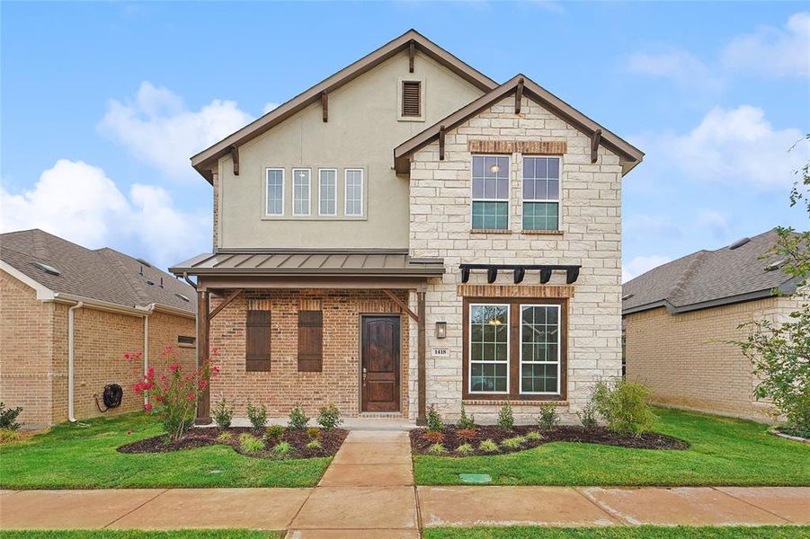 View of front of home featuring a front yard