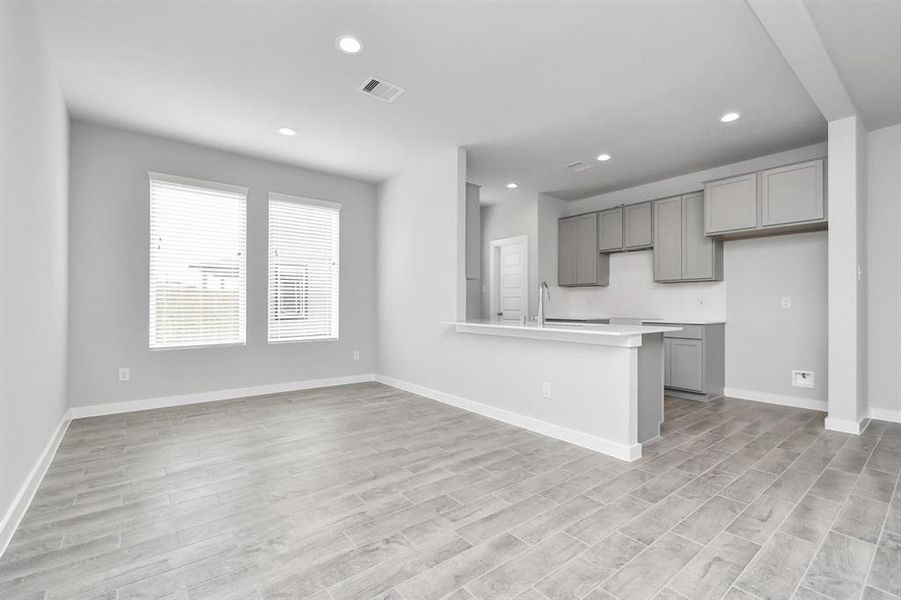 Dining space next to the kitchen for added convenience.