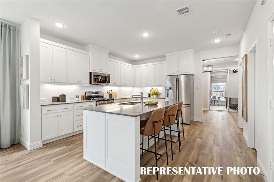 Your inner chef will love all the prep and storage space in this dream kitchen!  REPRESENTATIVE PHOTO