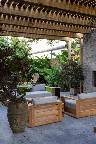 Melissa Halleran of Thompson + Hanson furnished the Pergola with furnishings for dining and reclining.  The alum of Parsons School of Design is responsible for buying and styling the inventory of the Thompson + Hanson Stone and Ivy House in Houston.