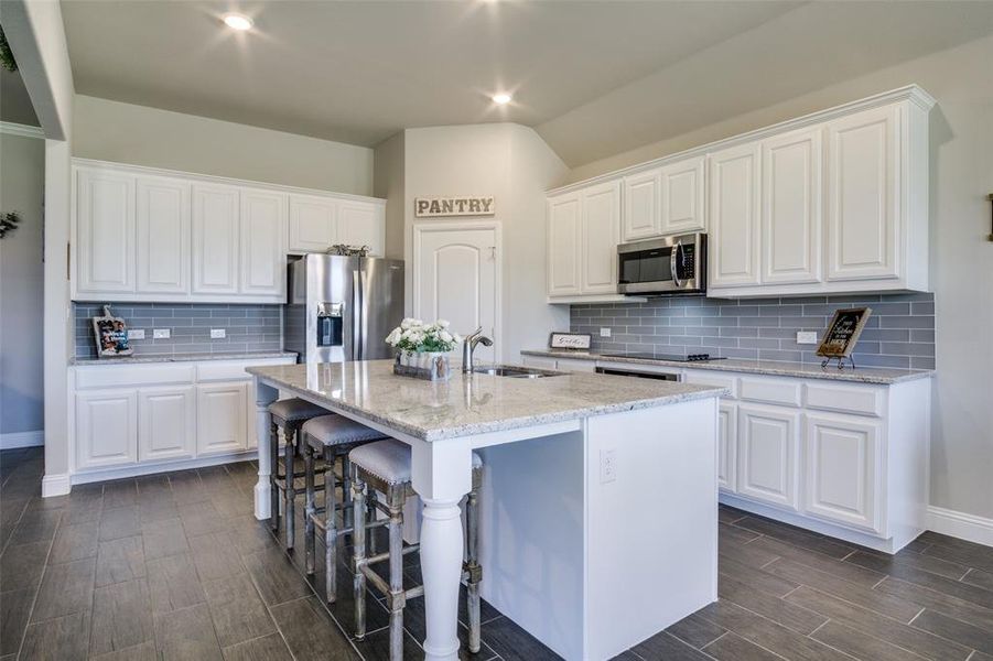 Kitchen Features a Large Island