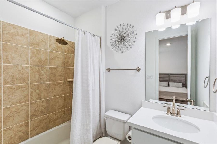 Full bathroom featuring shower / bath combo