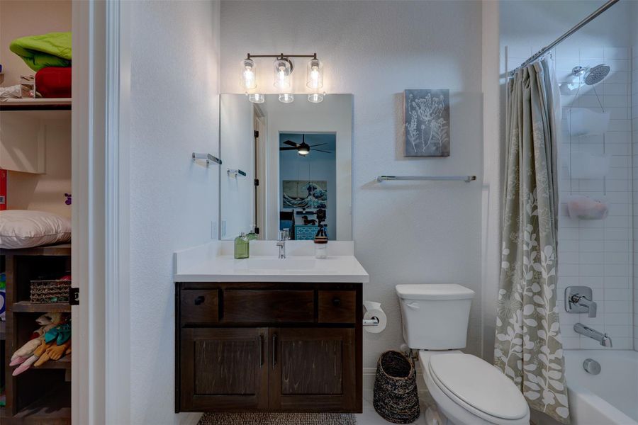 Bunk Bedroom Bath with Tub and walk in closet