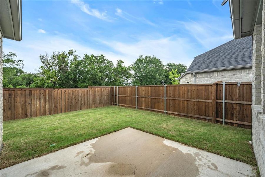 View of yard with a patio