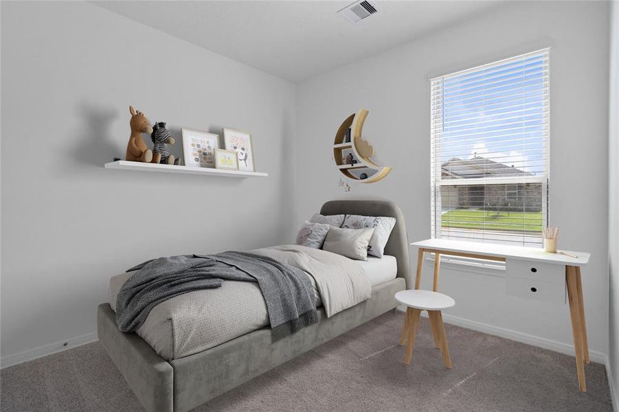 Secondary bedroom features plush carpet, neutral paint, lighting, large window with privacy blinds and ample sized closet space.