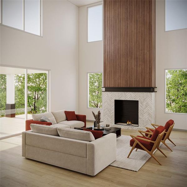 Living room featuring light hardwood / wood-style flooring, a tiled fireplace, and plenty of natural light