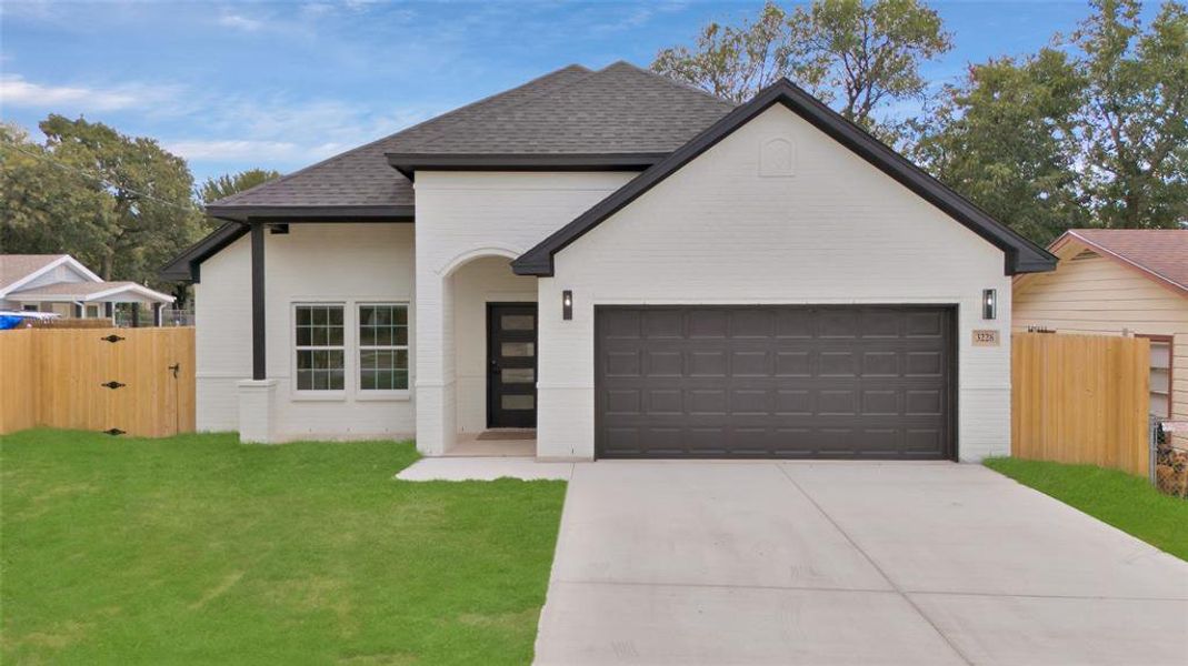 View of front of home with a front lawn