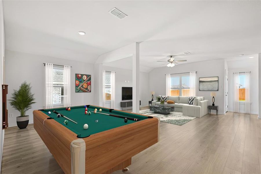 Game room with vaulted ceiling, billiards, light wood-type flooring, and ceiling fan