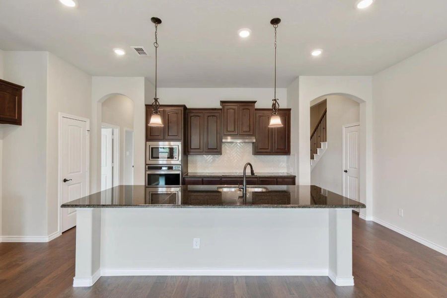 Kitchen | Concept 2671 at Oak Hills in Burleson, TX by Landsea Homes