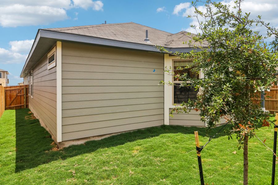 Back exterior of the Hughes floorplan at a Meritage Homes community.