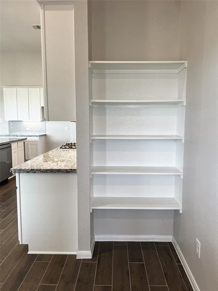 Additional shelving between the kitchen & mudroom. No wasted space