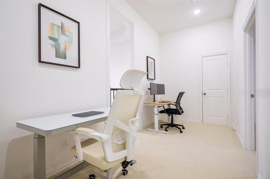 View of carpeted home office