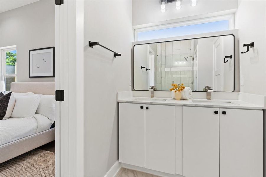 Bathroom with vanity and plenty of natural light