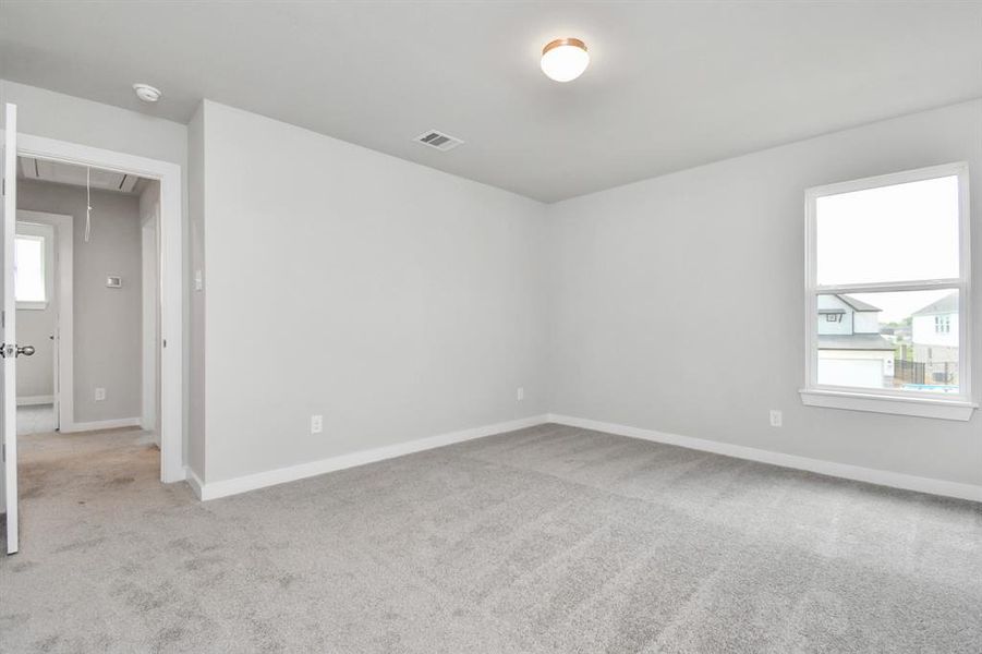 Step into this inviting bedroom retreat, boasting generously sized secondary bedrooms, plush carpeting underfoot, and ample natural light flooding through the large windows. With spacious closets to accommodate all your storage needs, this bedroom offers comfort and functionality in equal measure.