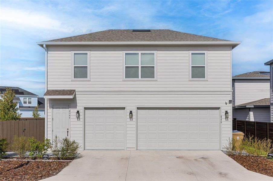 3 car garage and separate entrance to the garage apartment