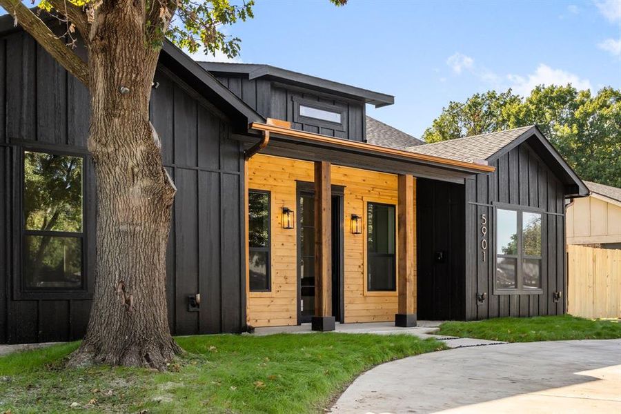 View of front of property with a front lawn