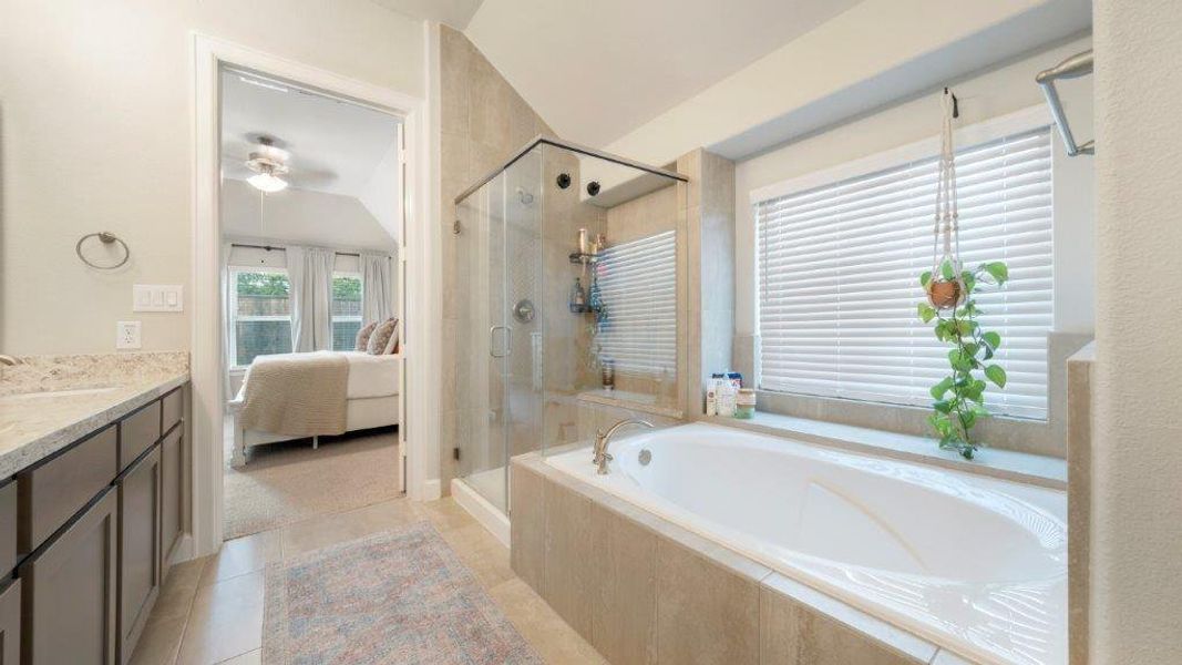 Relaxing soaking tub and separate oversized shower!