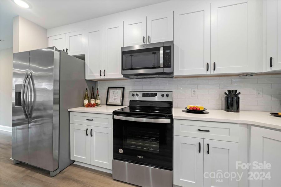 Stainless appliances includes Refrigerator.