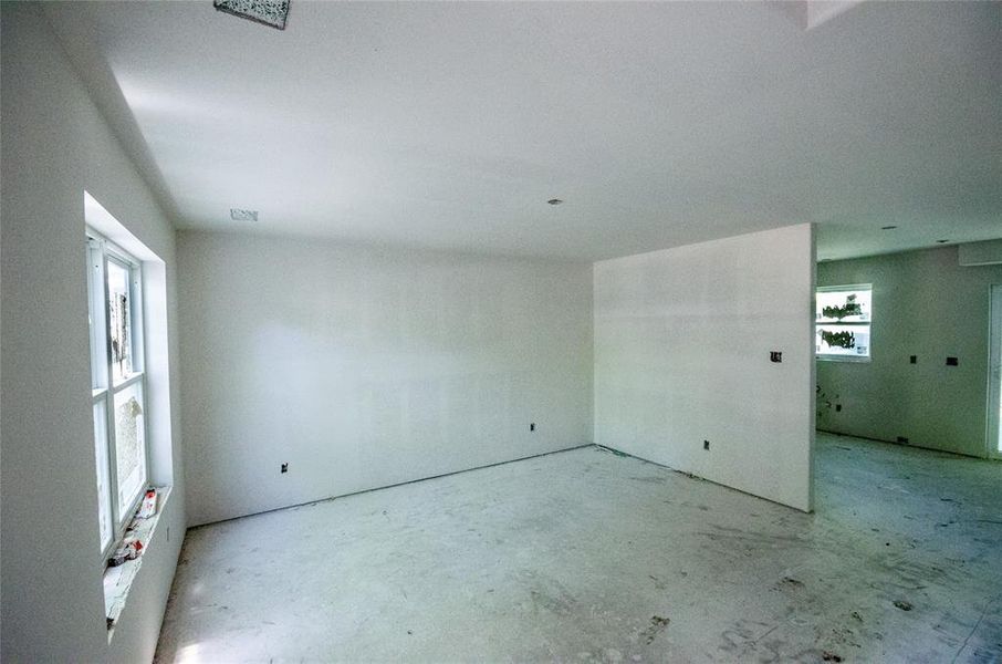 Unfurnished room featuring concrete floors