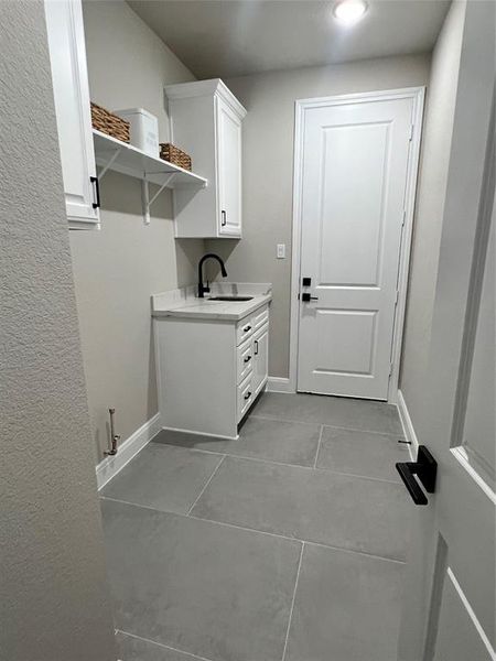 Other Interior Picture of a Similar Utility Room with Sink Built by Tx Best Home Builder.