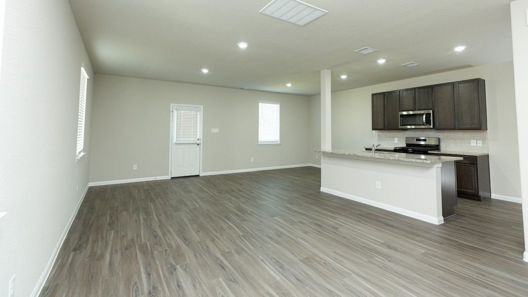 Family Room to Kitchen and Dining Area