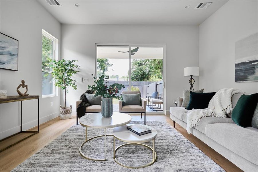 Huge living room with a ton of natural light and windows