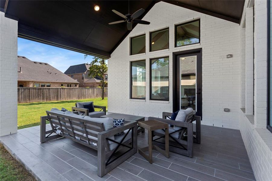 Imagine the brunches and birthday parties on your covered backyard patio!