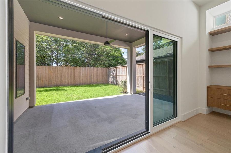 Sliding doors double the space and create seamless indoor-outdoor entertaining.