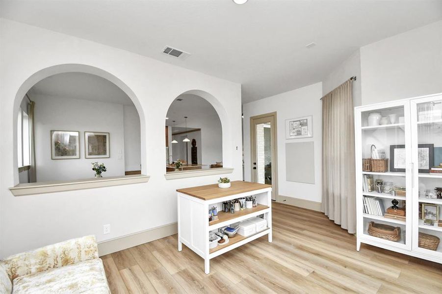 Another view of the sunroom/flex space overlooking the dining area.