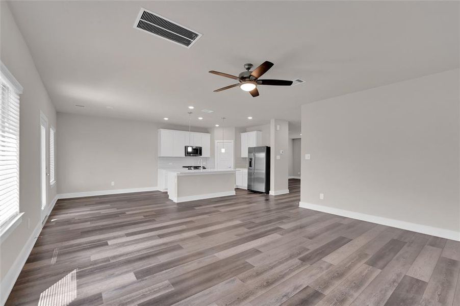 Alternate view of your first floor living areas showcasing the open ambiance of your new home.