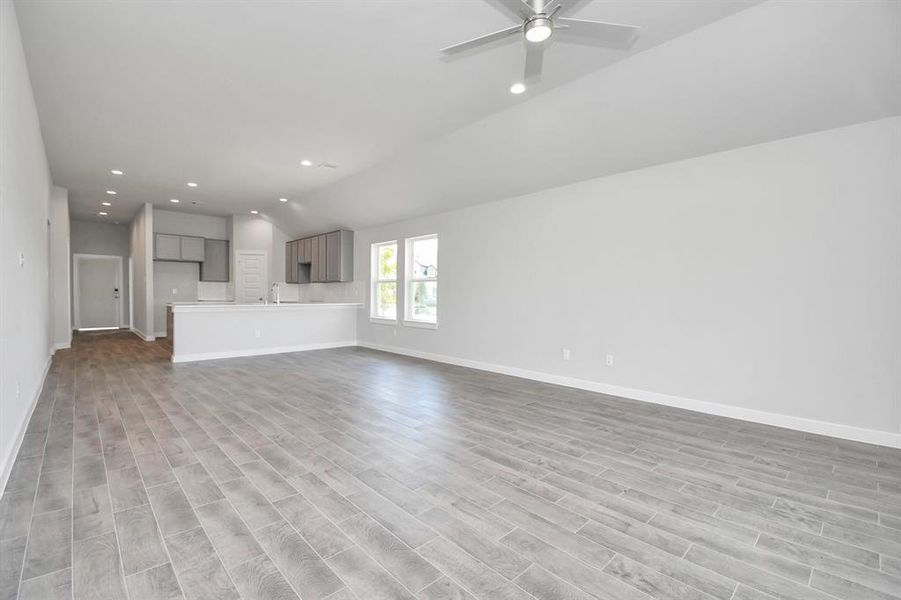 Another view of the family room. (Front door pictured is temporary).