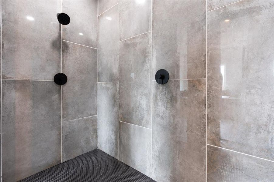 Bathroom featuring a tile shower