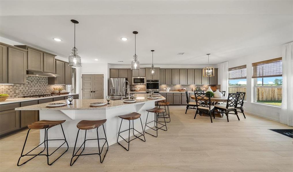 Lovely kitchen and dining area (*Photo not of actual home and used for illustration purposes only.)