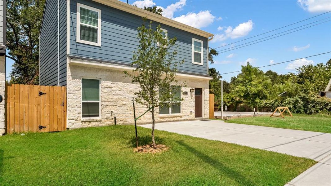 Gorgeous Curb Appeal With Beautiful Landscaping Invites You Into This Home.