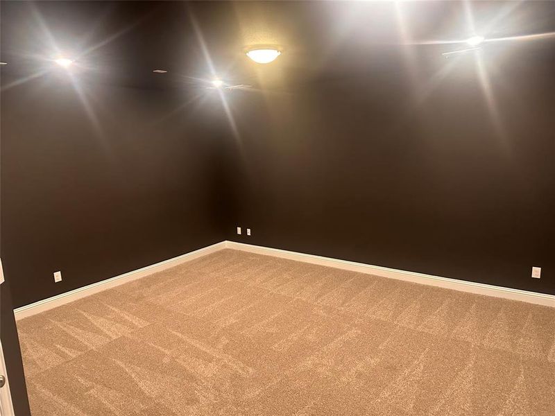 Empty room with carpet flooring