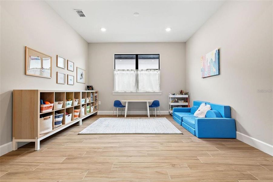 The dining room has an electrical box pre-wired for a ceiling fan or chandelier.