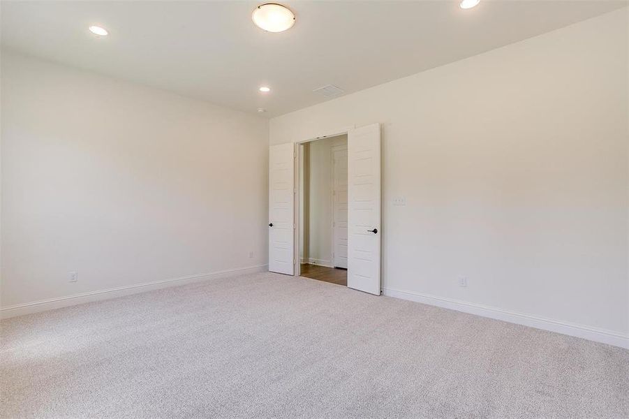 Spare room with carpet flooring