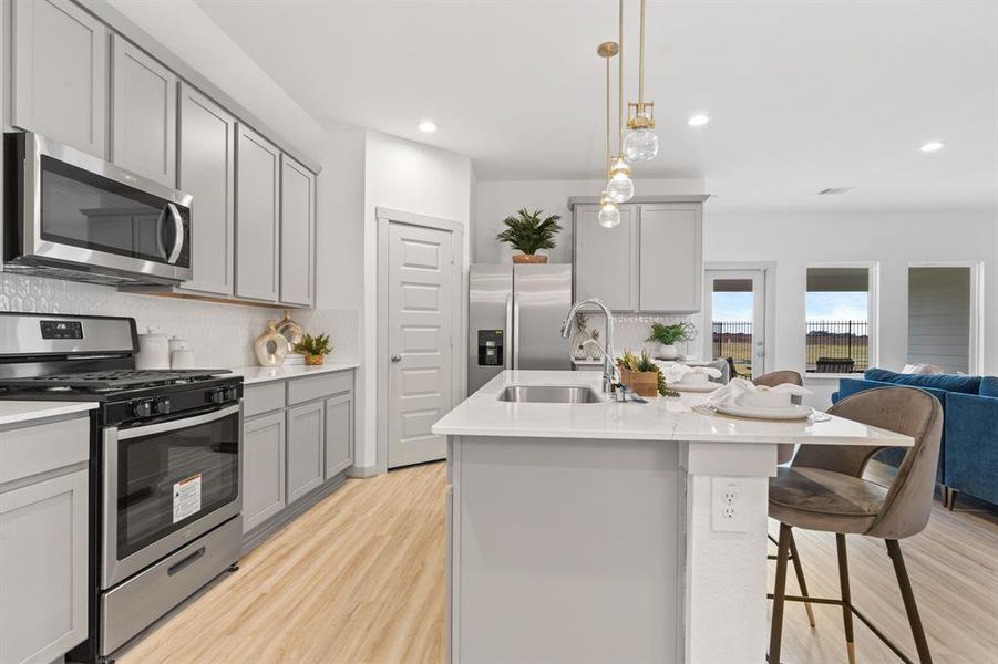 This Dramatic Gourmet Kitchen comes with Whirlpool Stainless Steel Gas Range, Built in Microwave Oven and Dishwasher! Stunning!   **Image representative of plan only and may vary as built**NEW Photos coming soon!