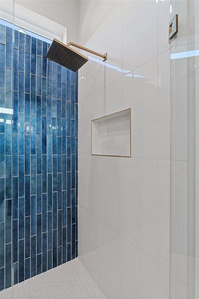 Bathroom with a tile shower