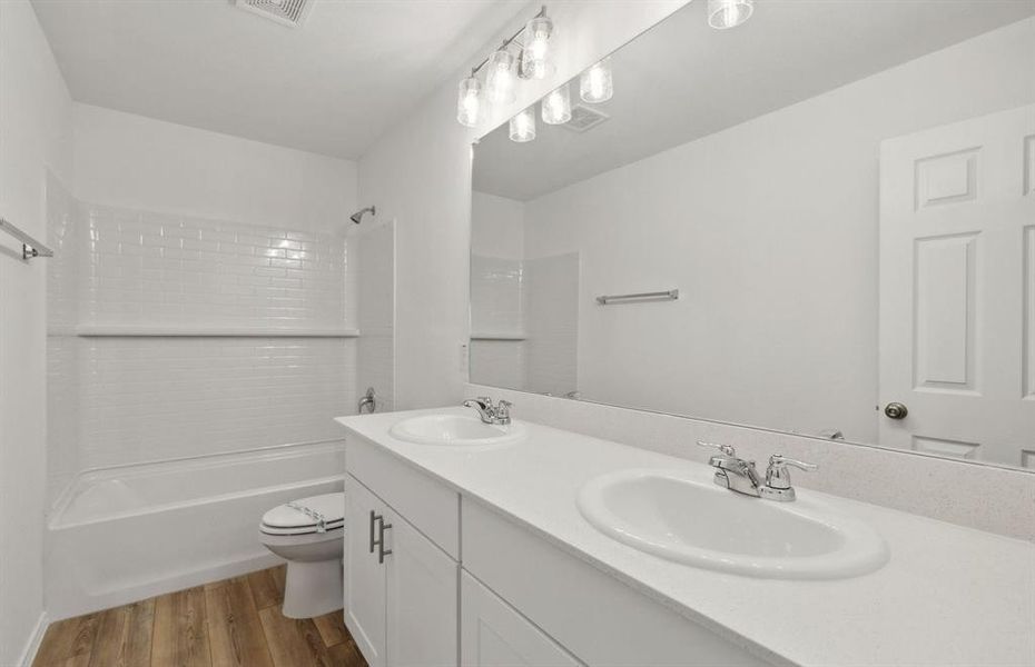 Upgraded secondary bathroom*real home pictured