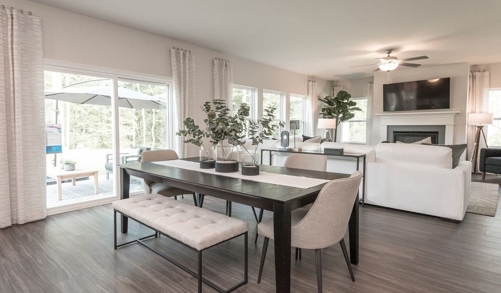 Gather the whole family around the dining table, at the heart of the open-concept living area.